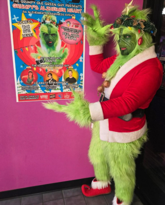 Grinch with poster from TMIV Design